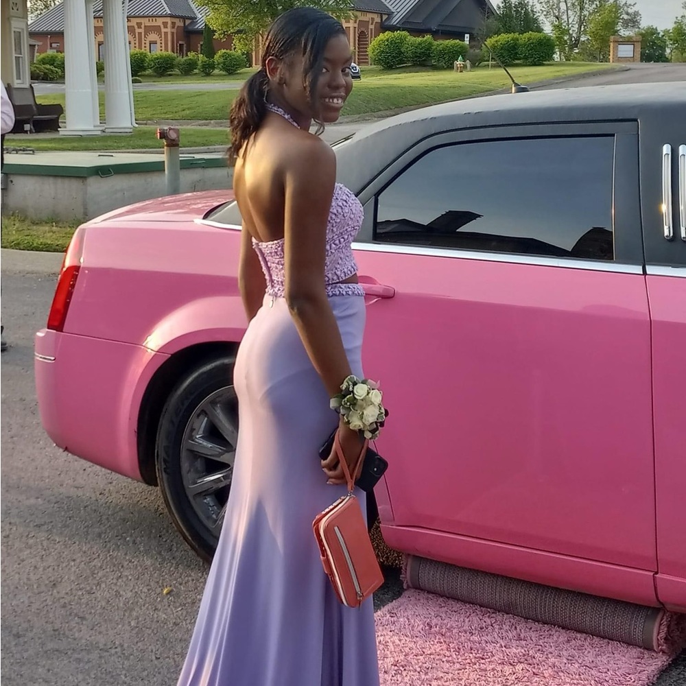 Size 2 two-piece lavender prom dress worn once.